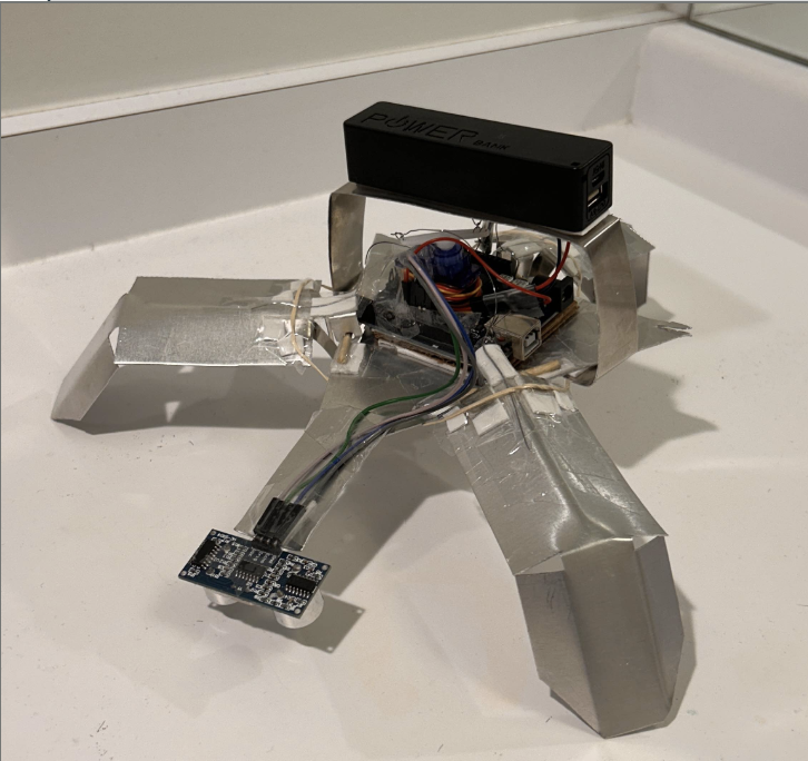 Claw Kent robotic claw, assembled with sheet metal, servo, and sonar sensor